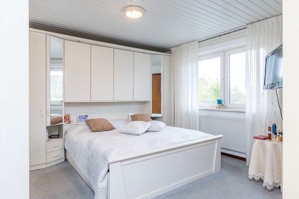 Foto - Te koop: Ruime goed onderhouden geschakelde 2 onder 1 kap woning in Bocholtz